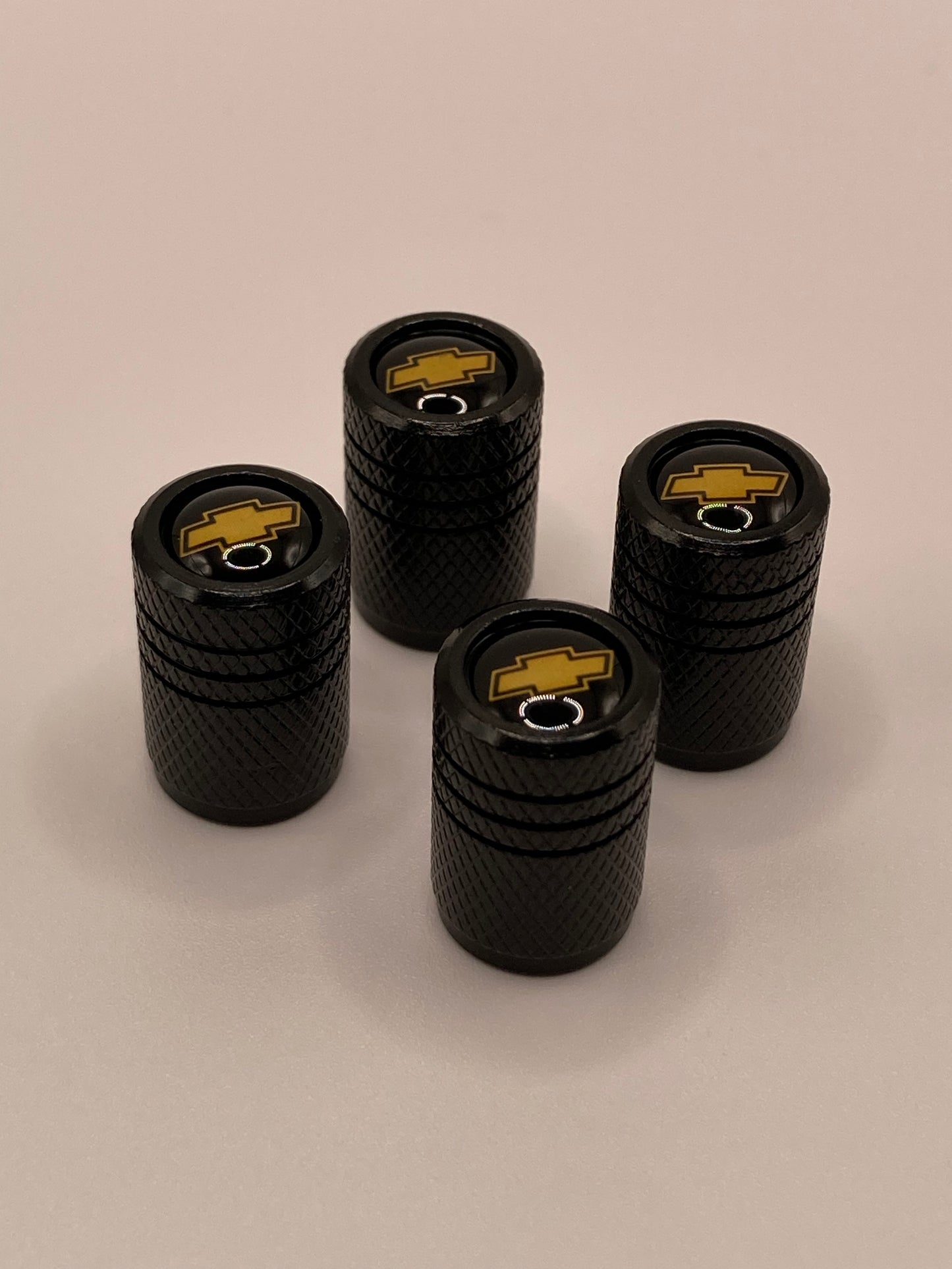 Chevrolet - 4pcs - black round valve stem cap set