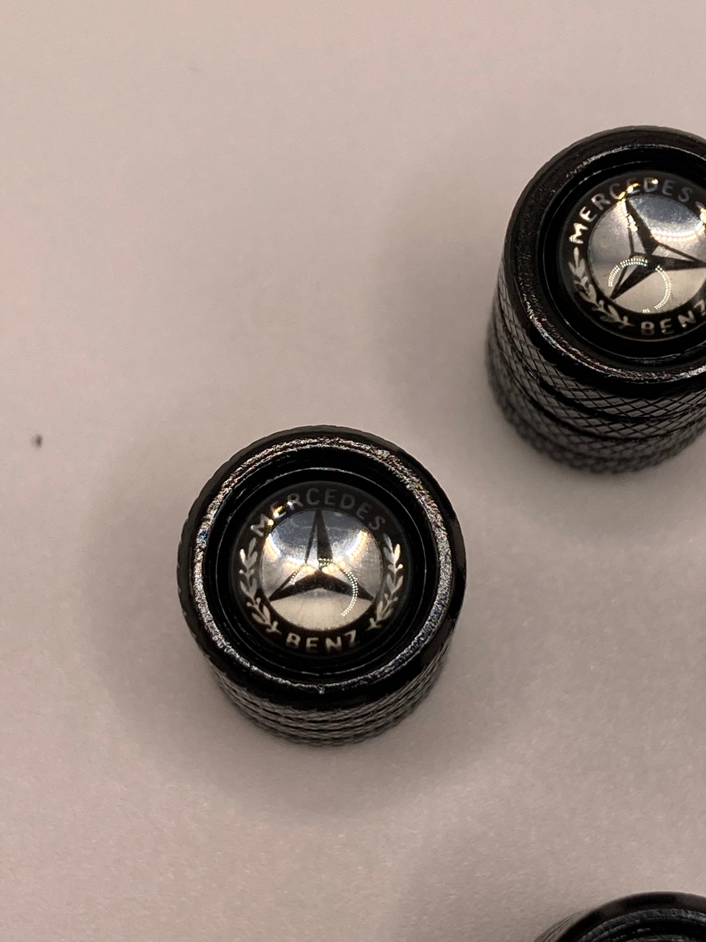 Mercedes Benz - black round valve stem cap set - 4pcs