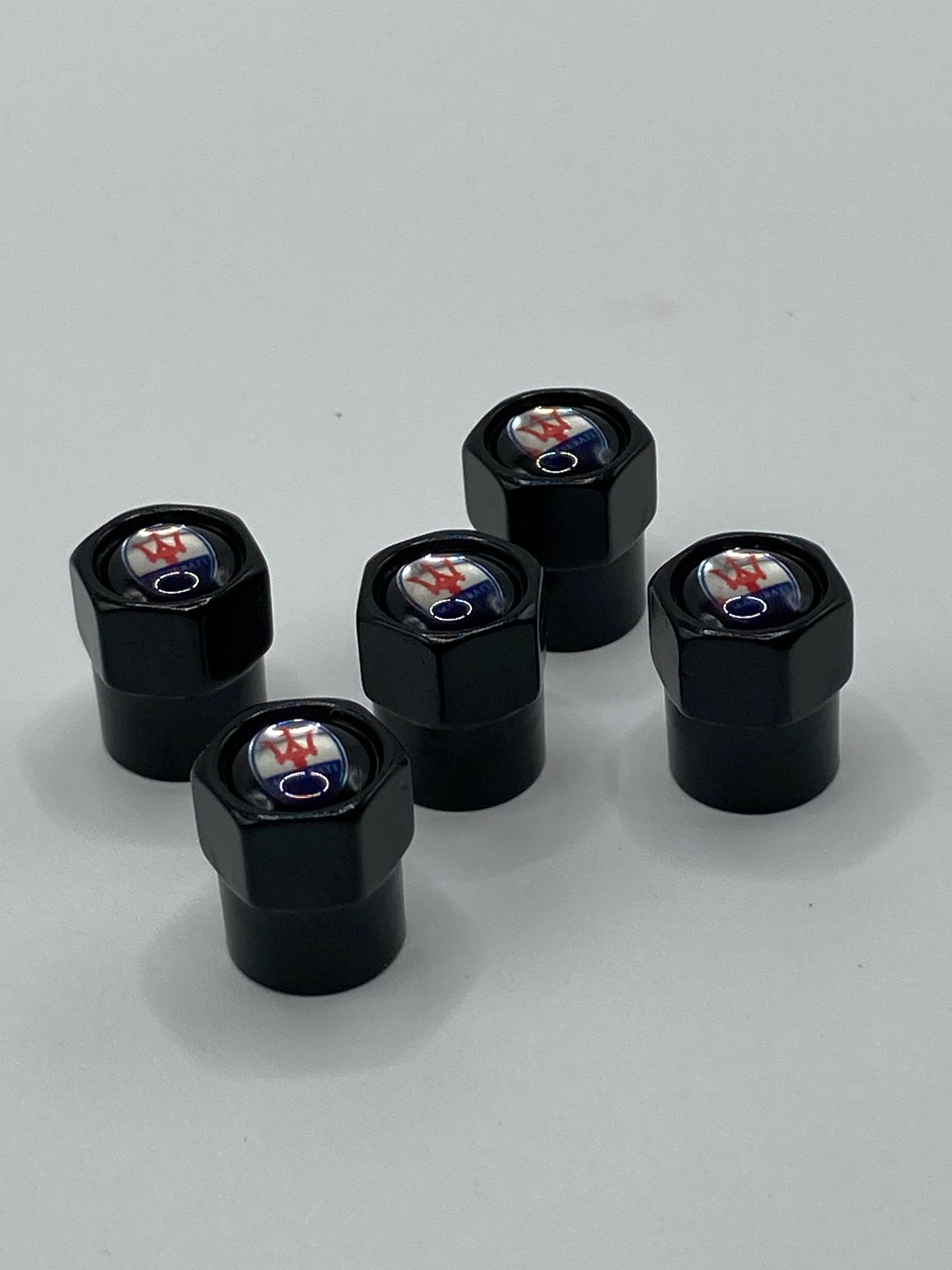 Maserati 5pcs black valve stem cap set