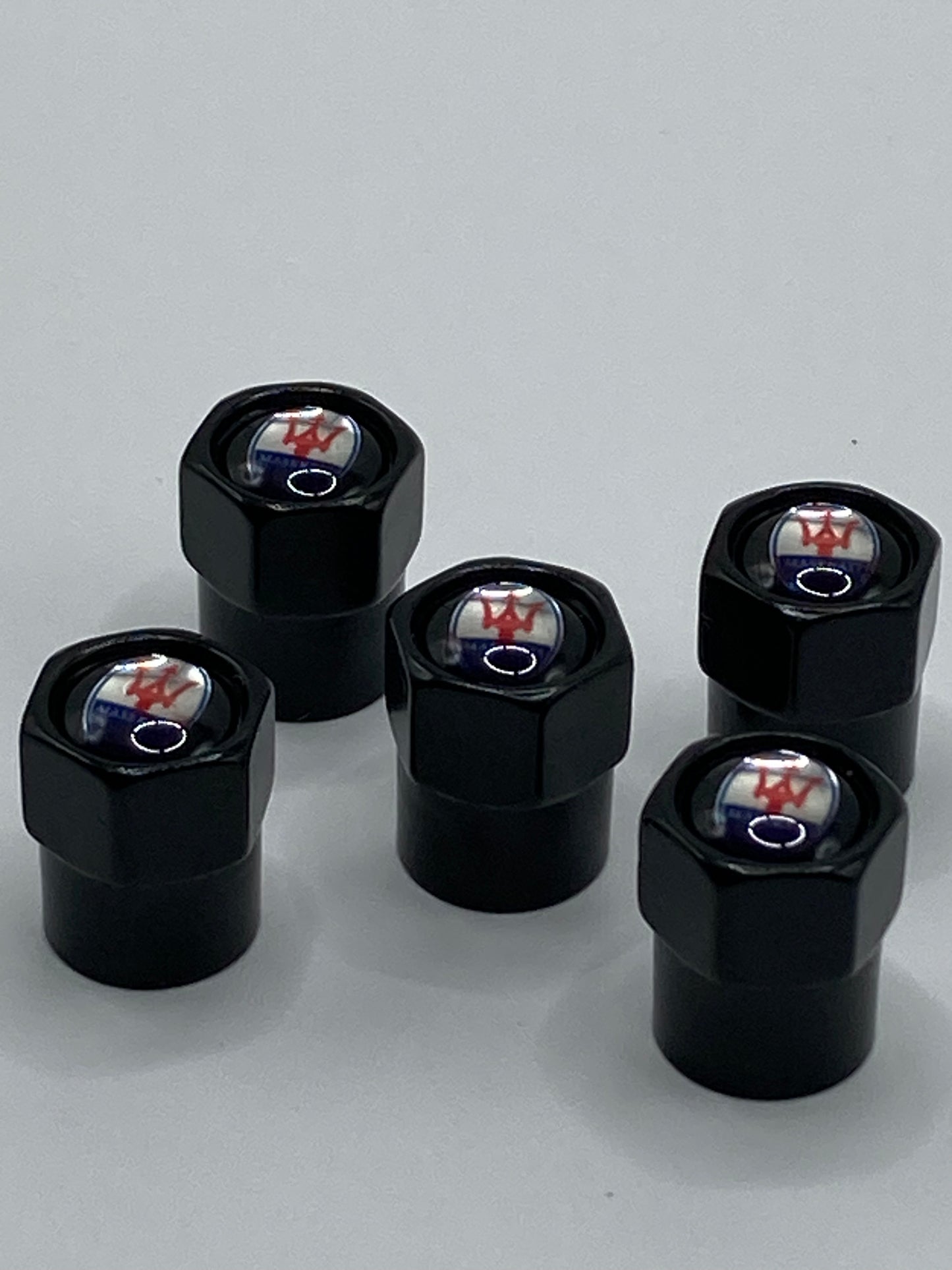 Maserati 5pcs black valve stem cap set