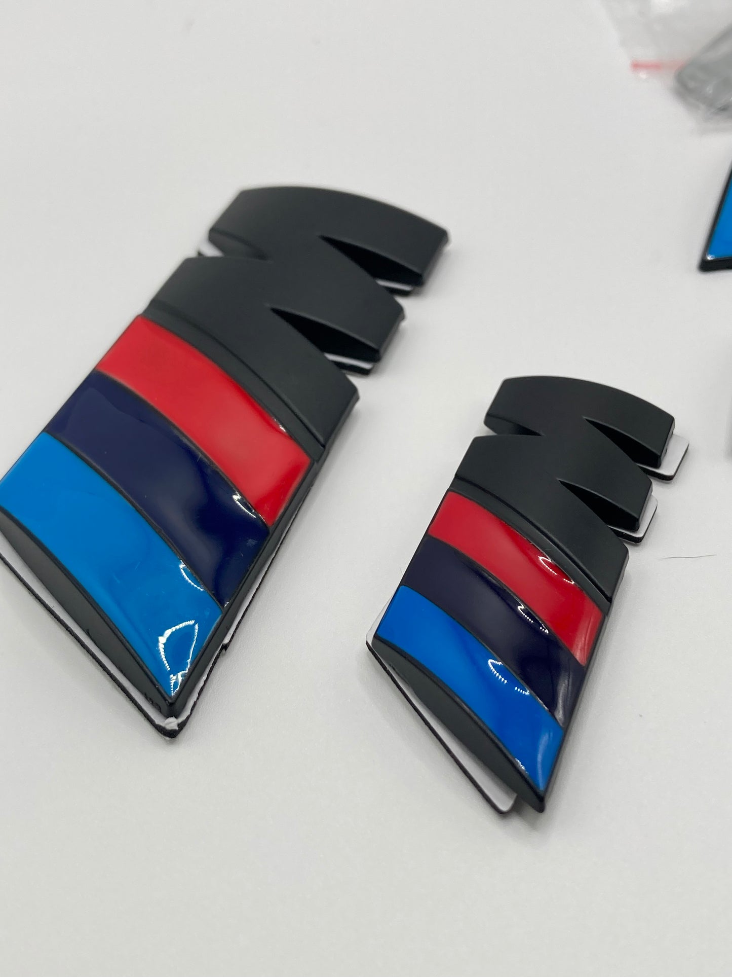 BMW M-Sport - 4pcs metal badge kit - Grill/Trunk/Fender - Matte Black w/gloss stripes