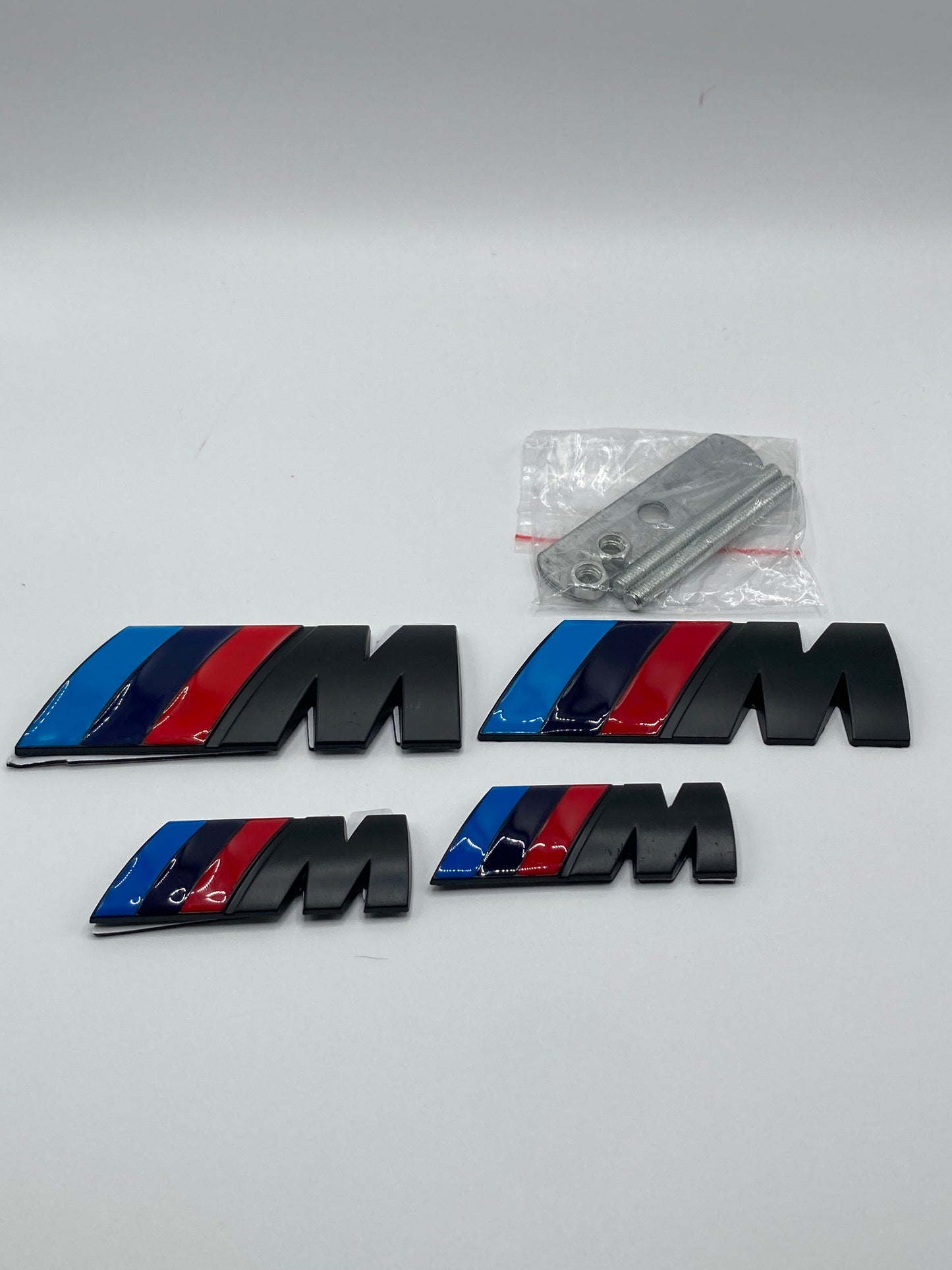 BMW M-Sport - 4pcs metal badge kit - Grill/Trunk/Fender - Matte Black w/gloss stripes