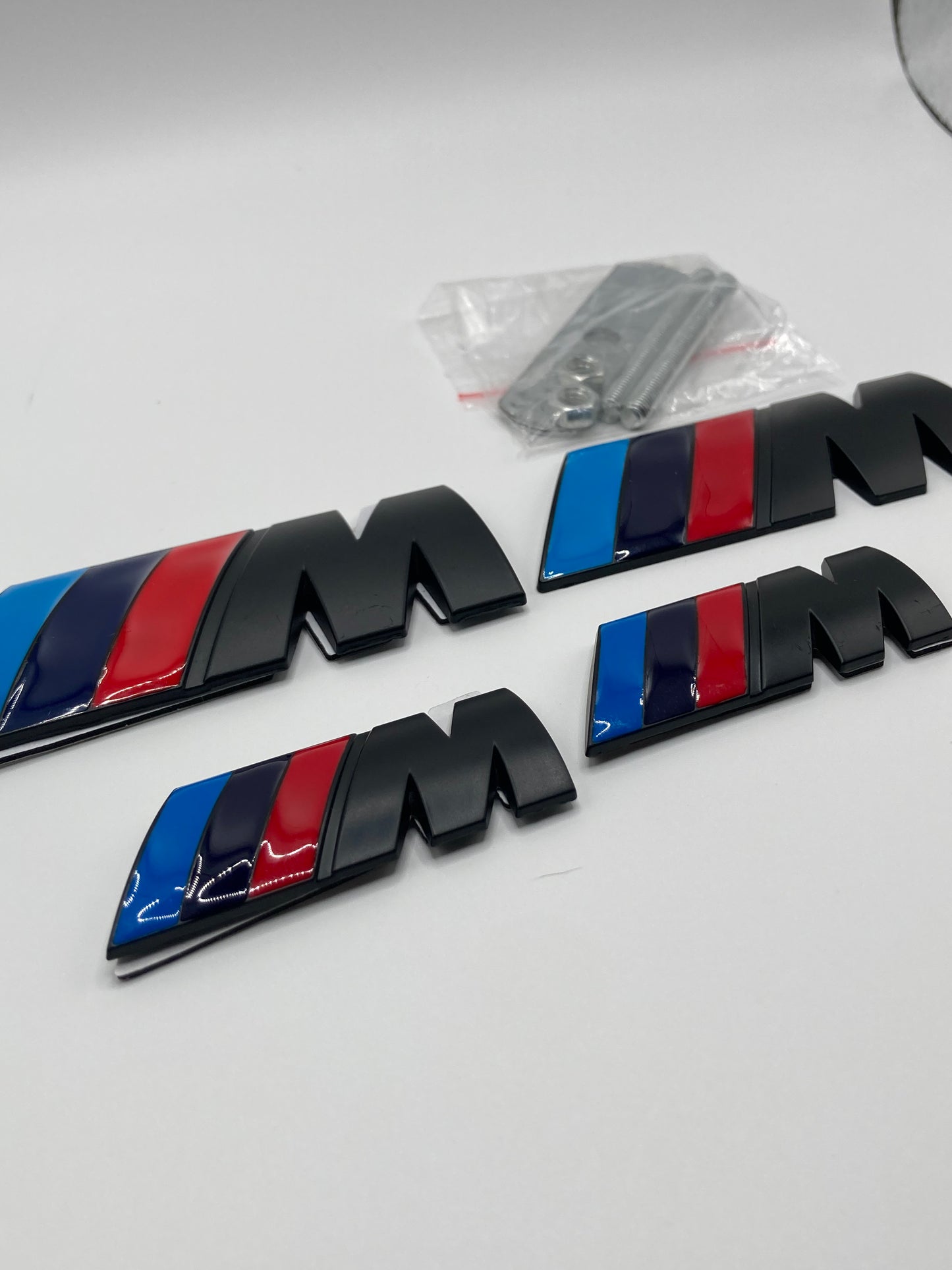 BMW M-Sport - 4pcs metal badge kit - Grill/Trunk/Fender - Matte Black w/gloss stripes