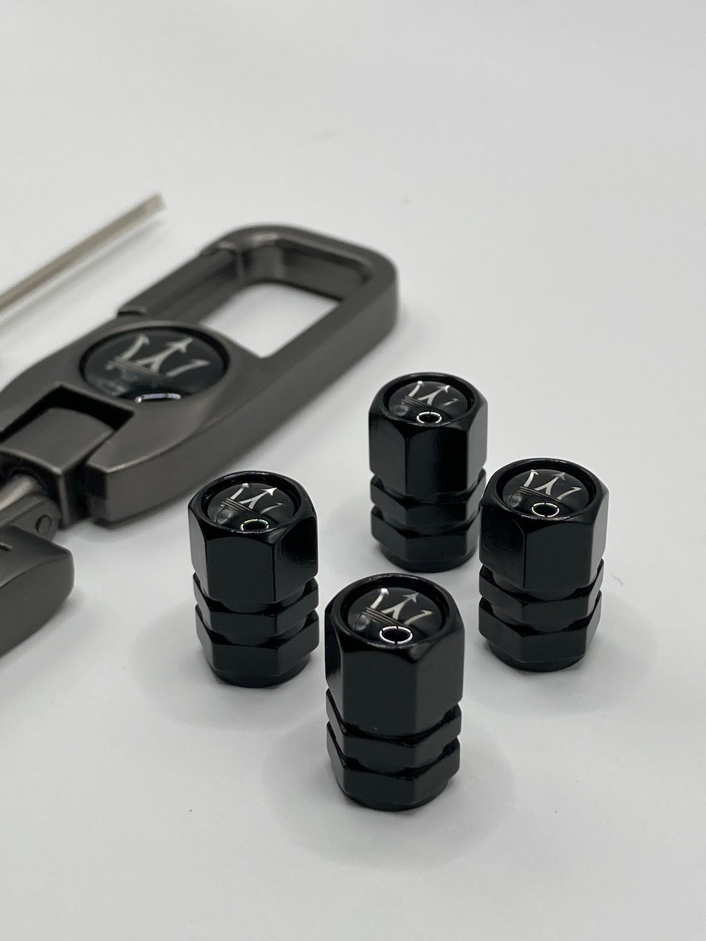 Maserati 5pcs gift set - Clip-style Keychain and 4pcs valve stem caps