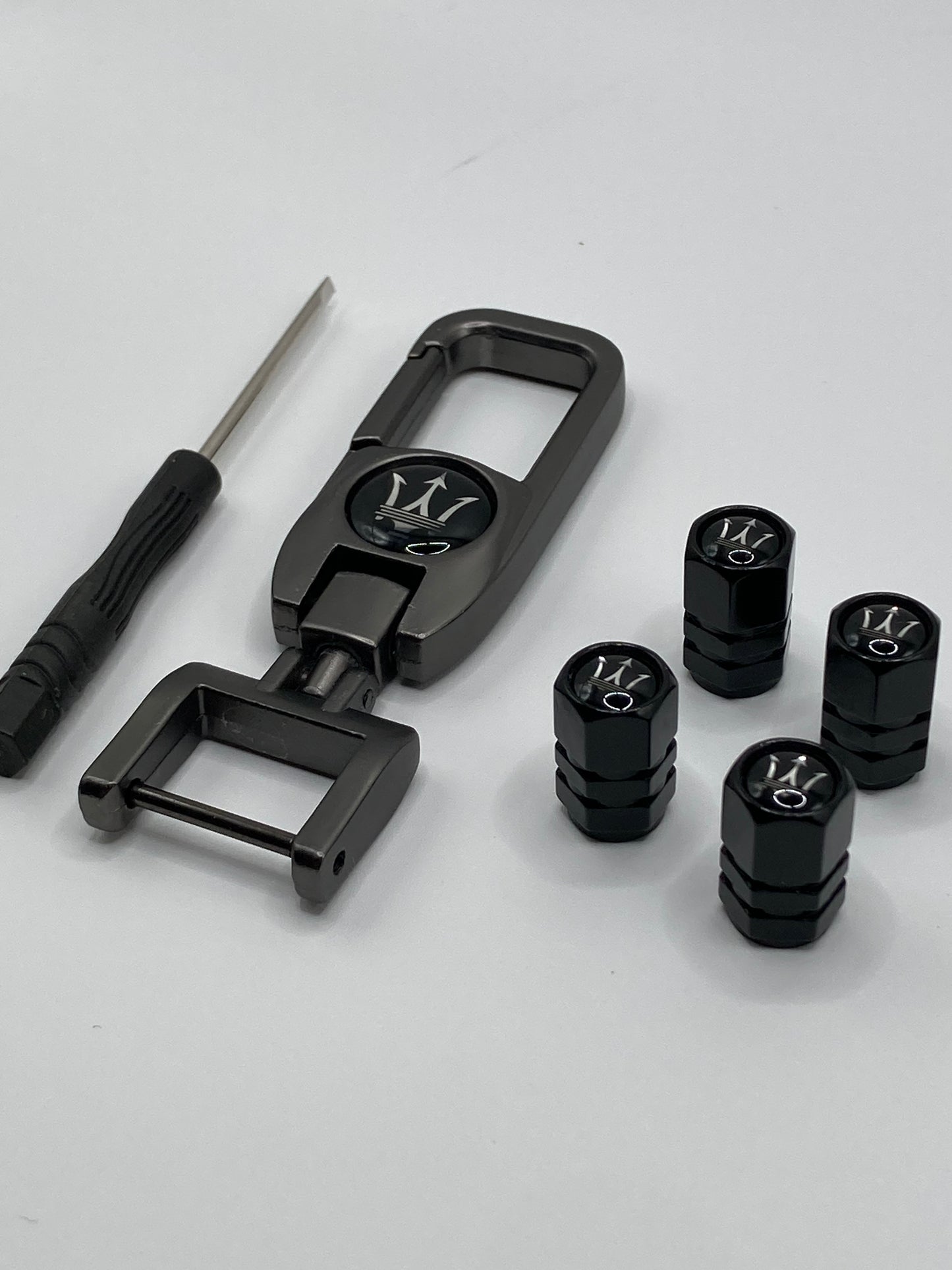 Maserati 5pcs gift set - Clip-style Keychain and 4pcs valve stem caps