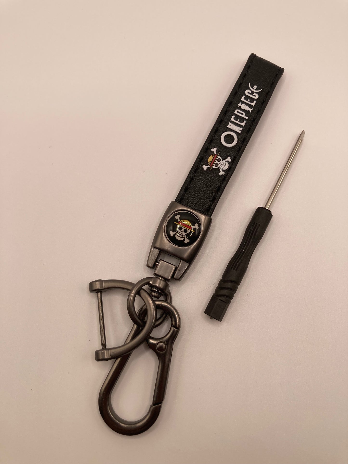One piece - black leather Keychain