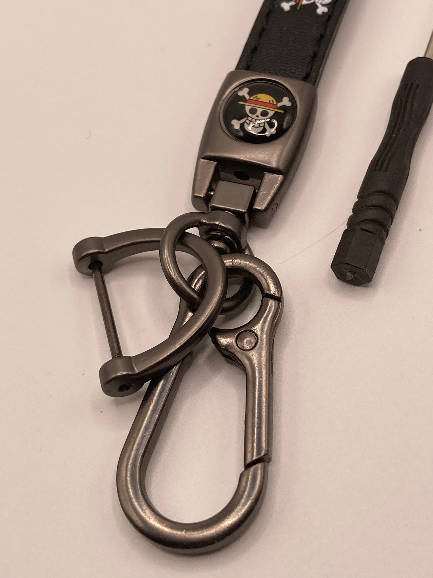 One piece - black leather Keychain
