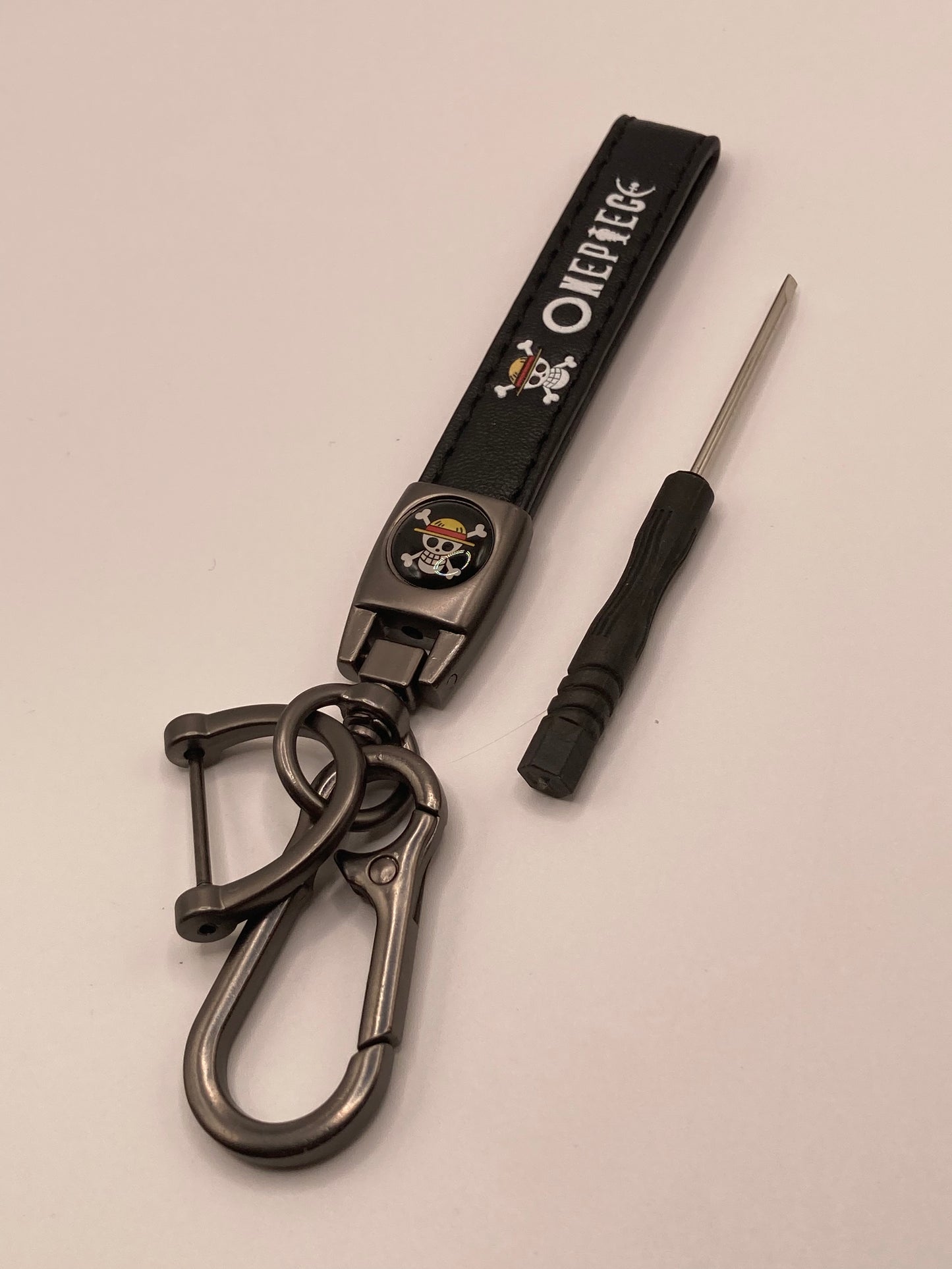 One piece - black leather Keychain