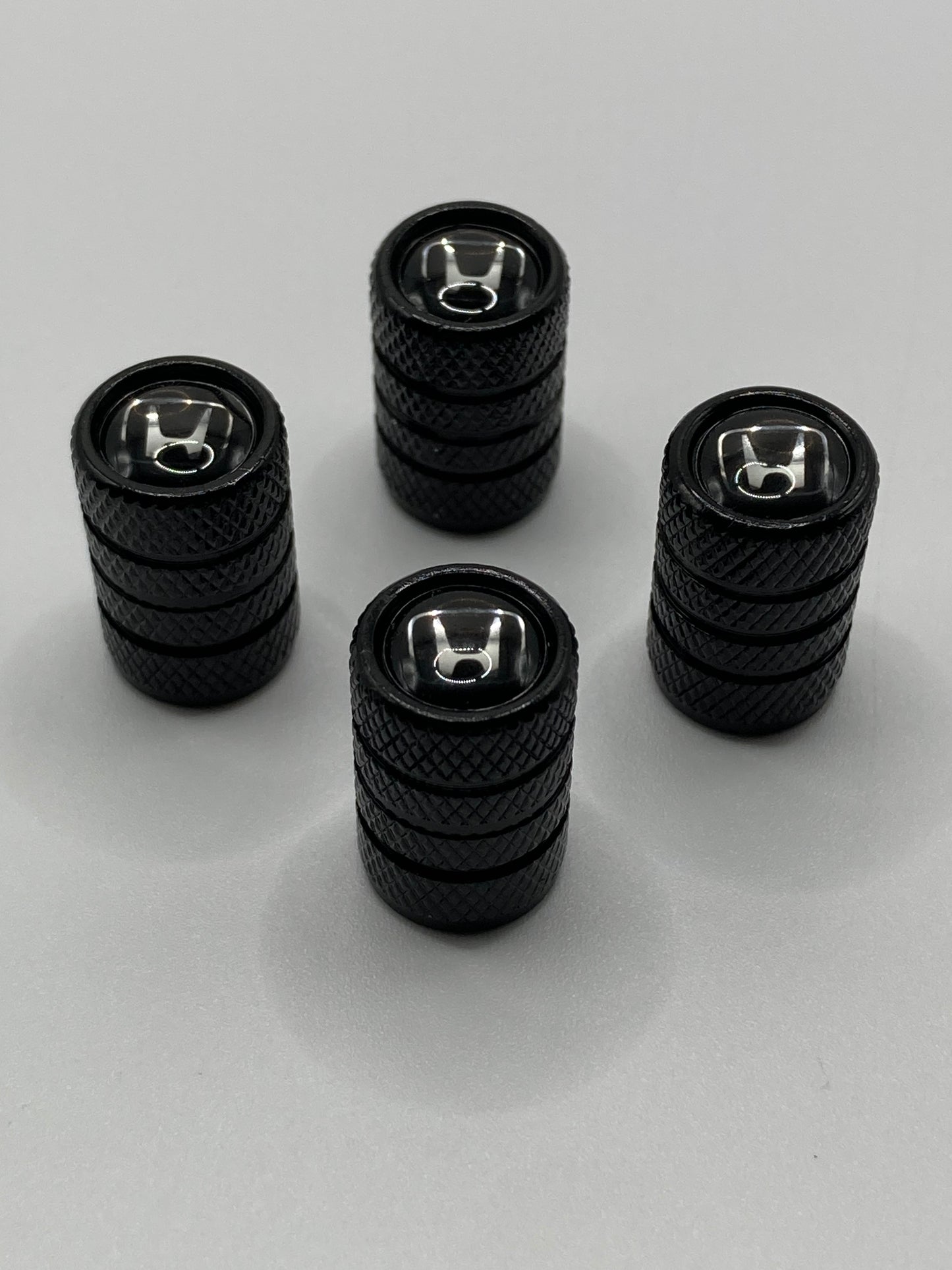 Honda - black valve stem cap set - 4pcs - chrome logo