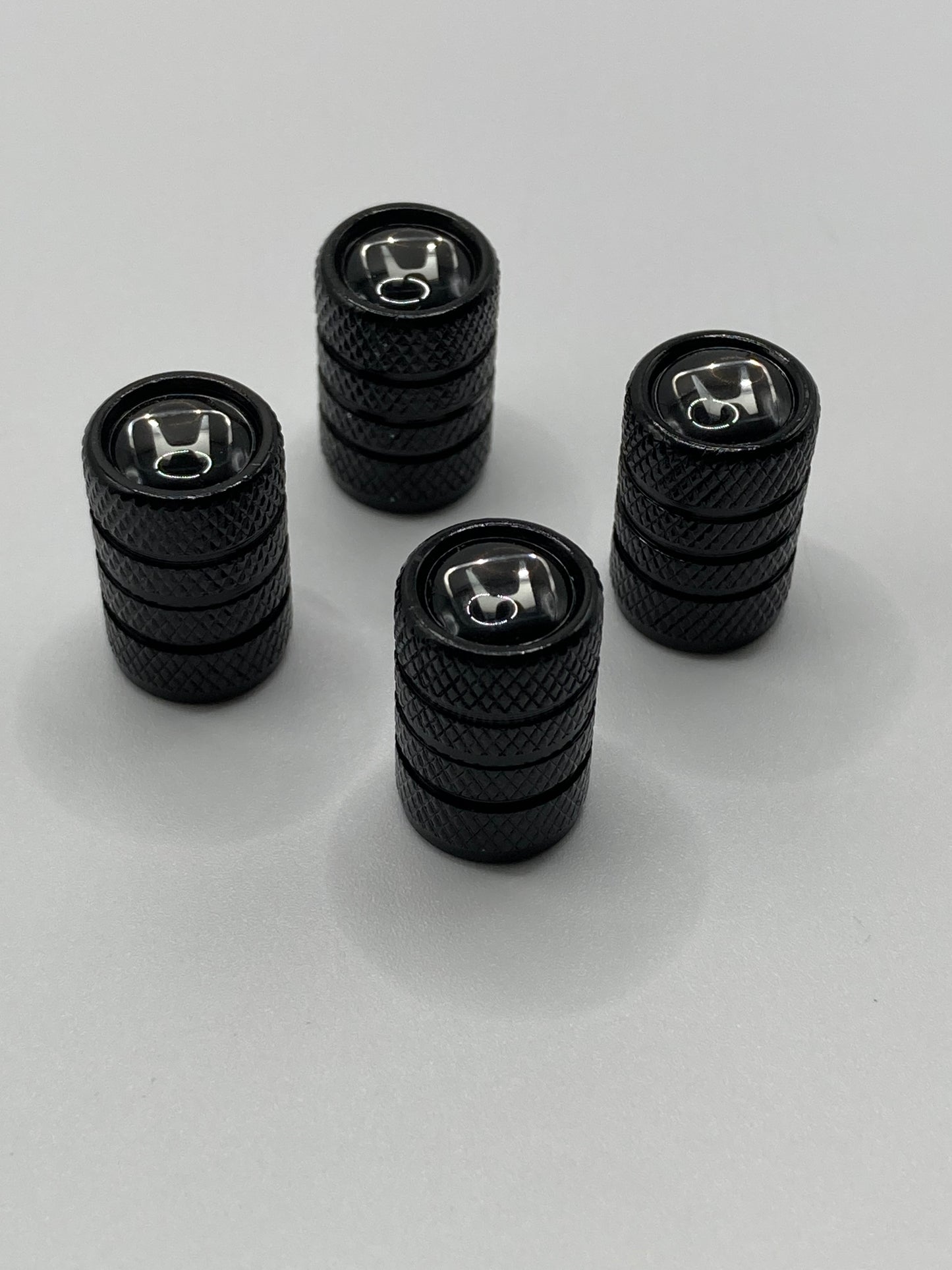 Honda - black valve stem cap set - 4pcs - chrome logo