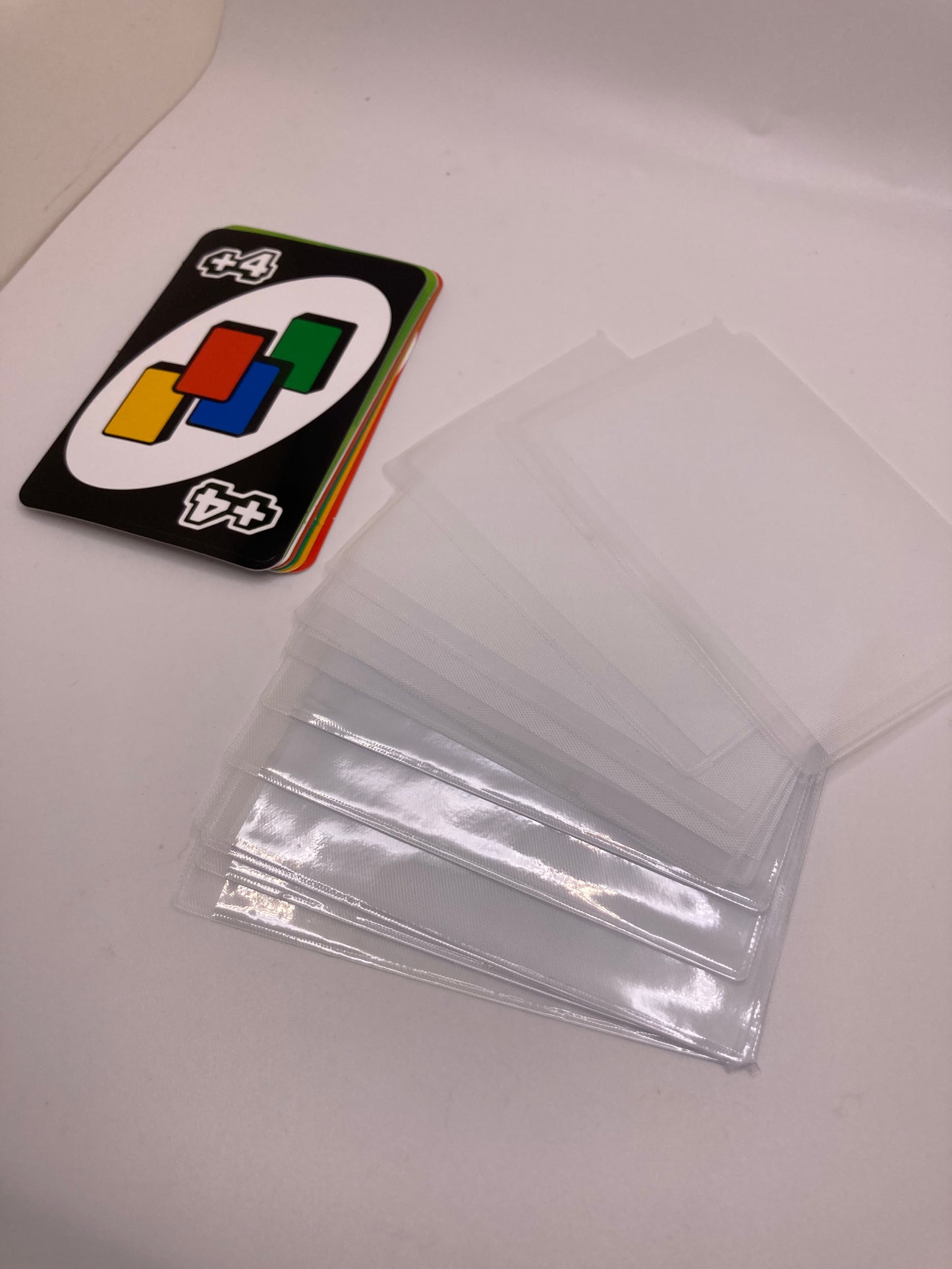 8pcs set - Themed Credit Card Covers - with protective pouches - UNO - Monopoly