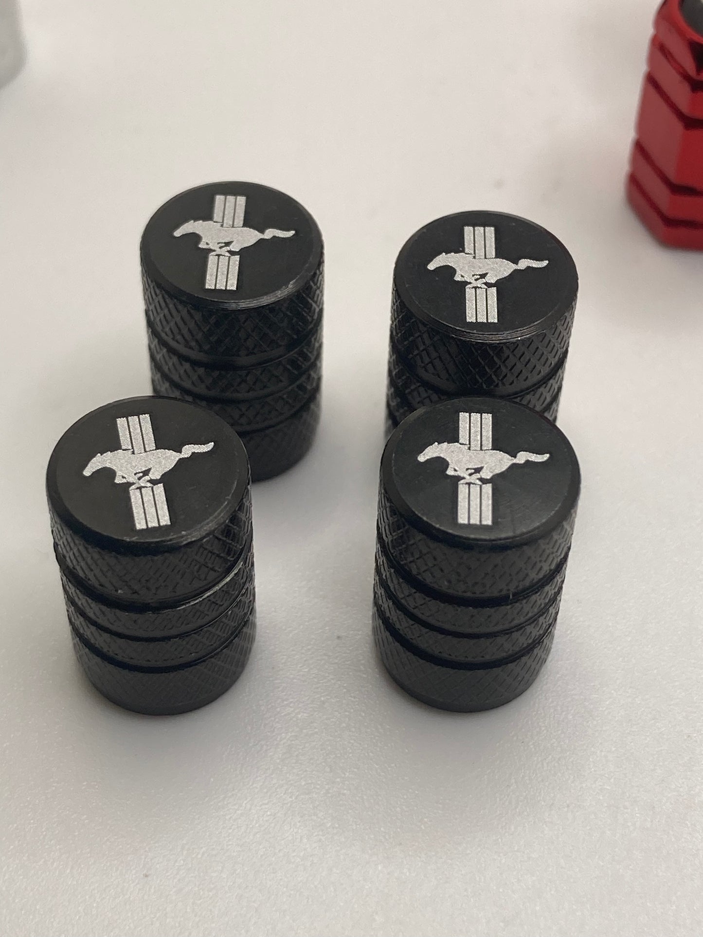 Mustang - Valve Stem Cap Set - Black w/white logo - 4pcs set