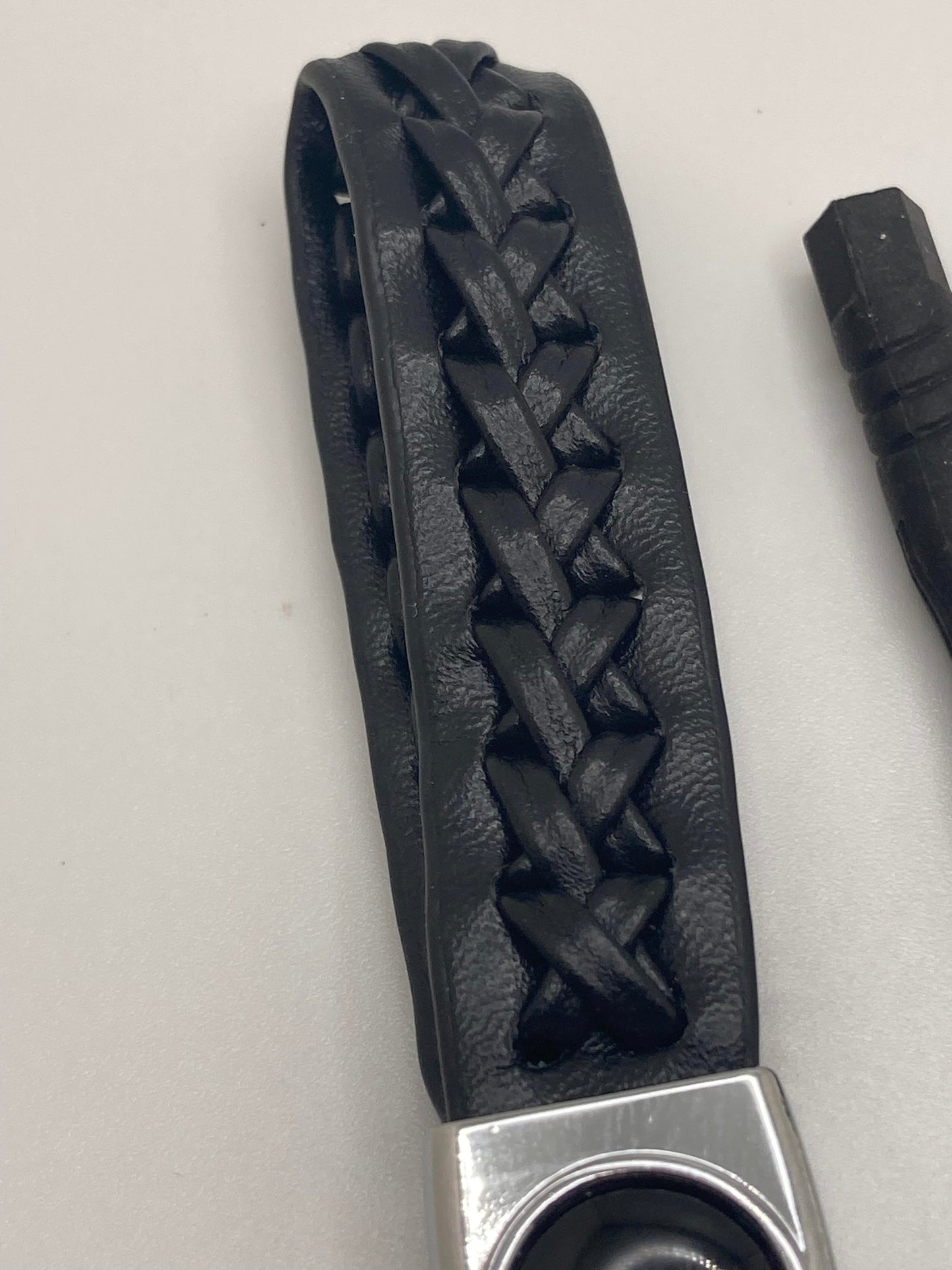 RAM black leather keychain