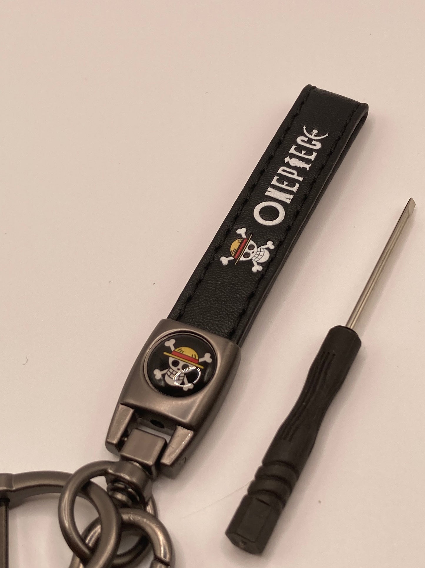 One piece - black leather Keychain
