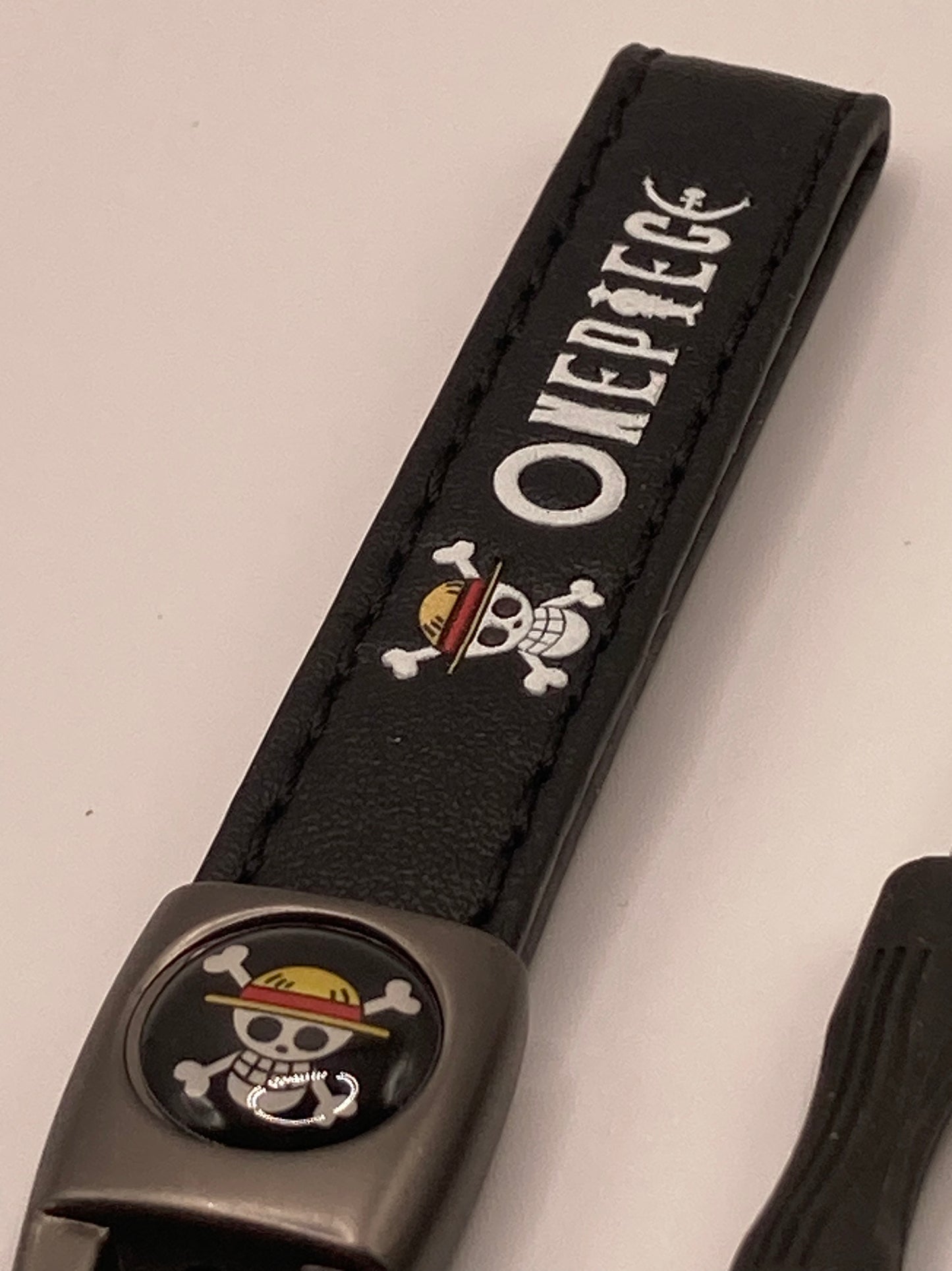 One piece - black leather Keychain