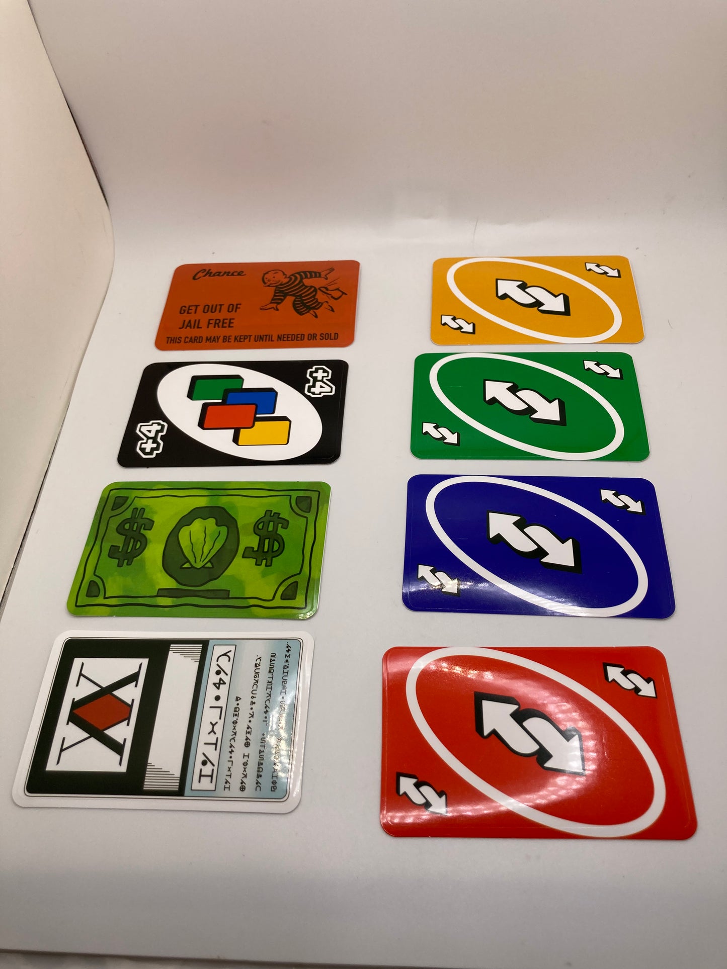 8pcs set - Themed Credit Card Covers - with protective pouches - UNO - Monopoly