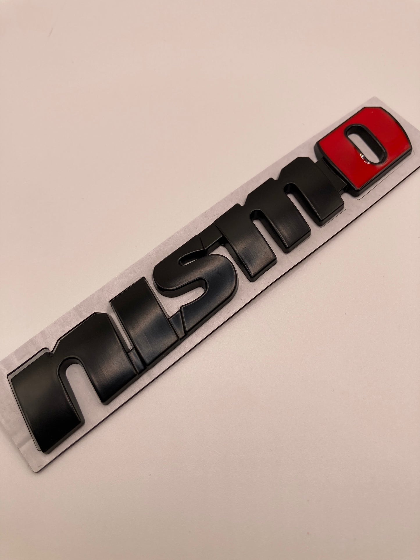 Nissan - Nismo metal badge trunk/fender emblem