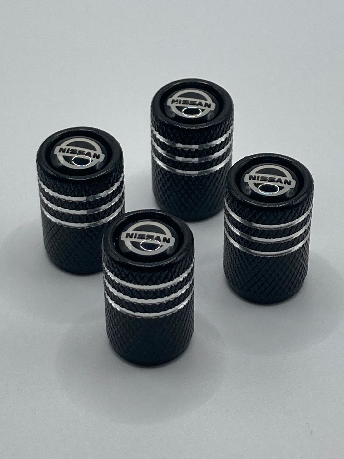 Nissan - blk/silver - Valve Stem Cap Set - 4pcs