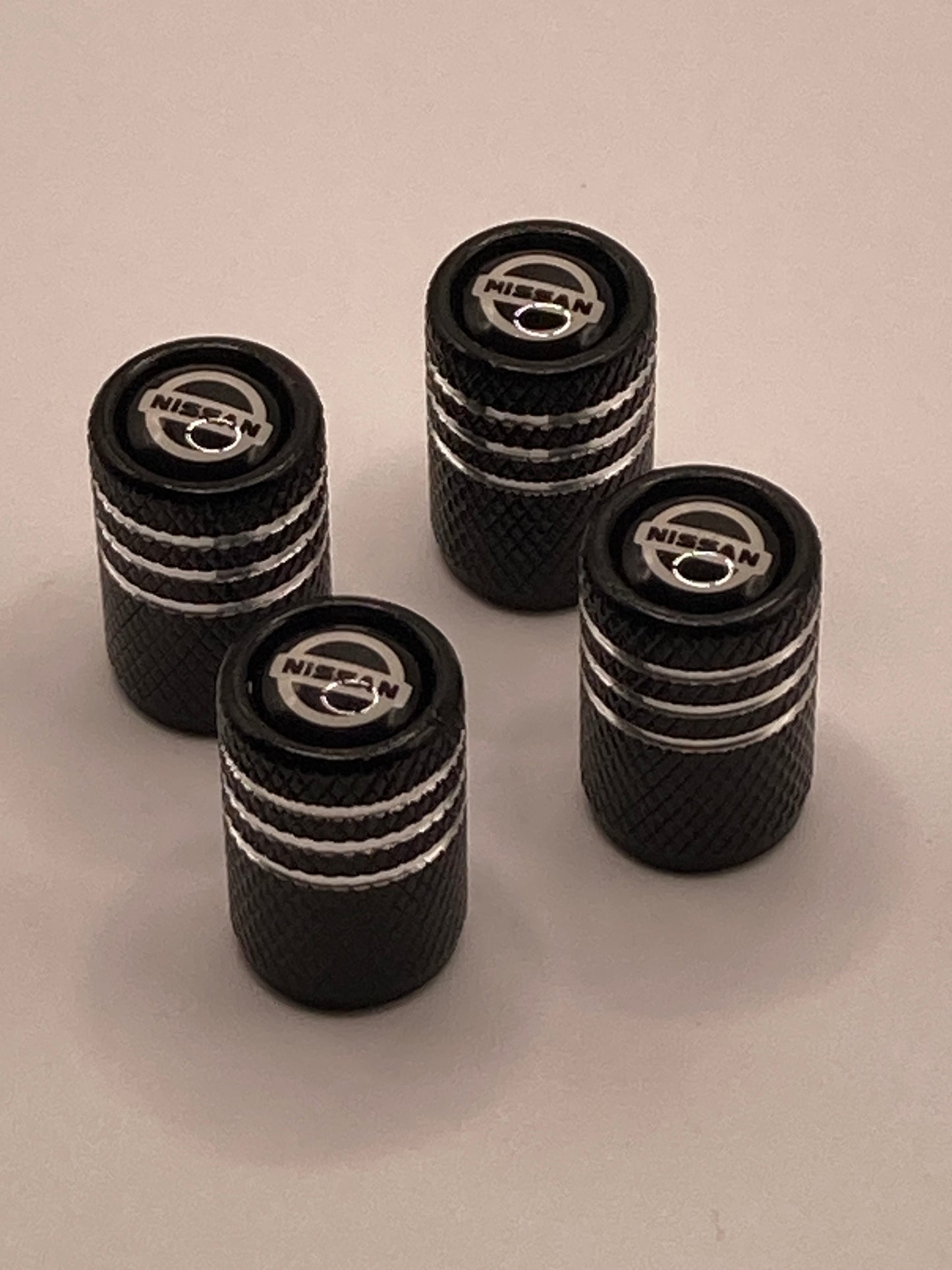 Nissan - blk/silver - Valve Stem Cap Set - 4pcs
